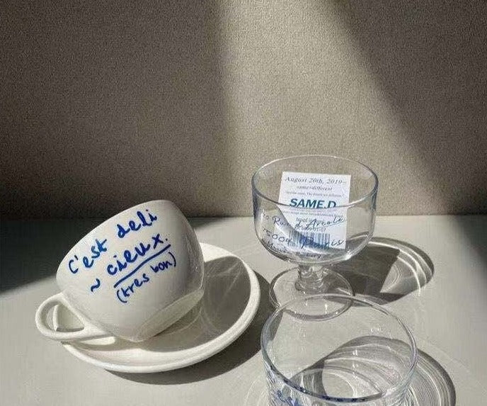 Blue letter ceramic mug and saucer set